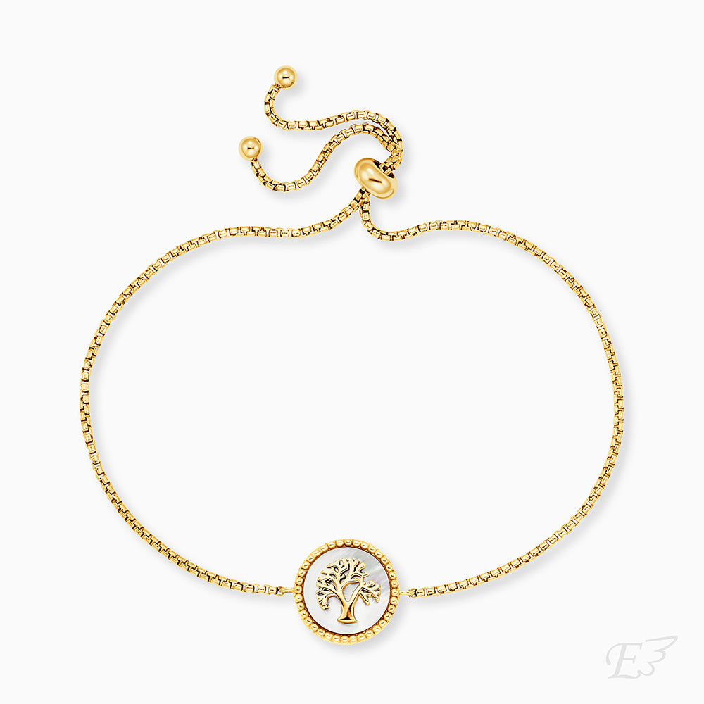 Engelsrufer Armband in gold mit Lebensbaum auf weißem Perlmutt